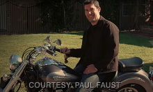 A man (Paul Faust as Paul Faust on "The Office") sitting on a motorcycle.