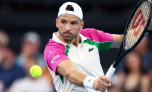 Grigor Dimitrov of Bulgaria plays a backhand