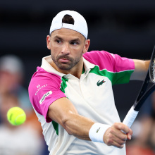 Grigor Dimitrov of Bulgaria plays a backhand