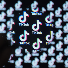 Tiktok logo is seen through a magnifier in Ankara, Turkiye on January 14, 2024.