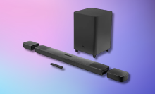 The JBL Bar 9.1 channel soundbar with detachable wireless speakers and a subwoofer, laid out on a gradient blue and purple background.