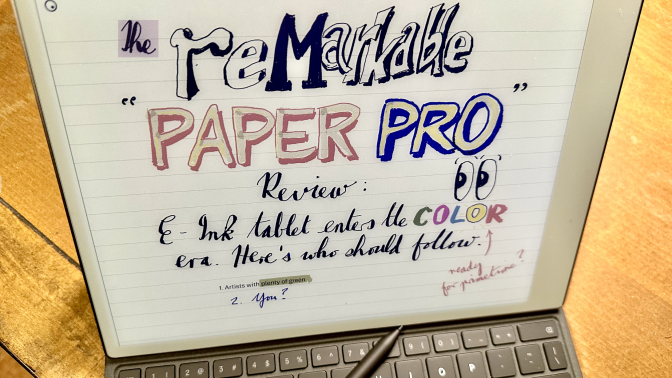 A Remarkable Paper Pro e-ink screen has a 'Remarkable Paper Pro' review written on it. 