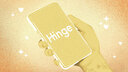 A drawn hand holding a phone with the Hinge logo 