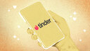 A drawn hand holding a phone with the Tinder logo 