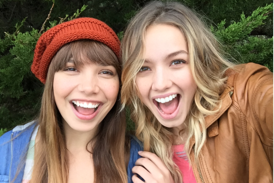 Picture showing a smiling woman in a selfie.