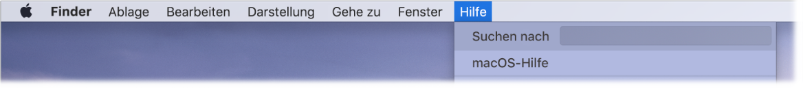 Ein Ausschnitt des Schreibtischs mit dem geöffneten Menü „Hilfe“, in dem die Menüoptionen „Suchen“ und „macOS-Hilfe“ zu sehen sind.