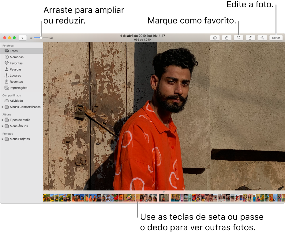A janela Fotos mostrando uma foto ampliada à direita com uma fileira de miniaturas abaixo. A barra de ferramentas na parte superior inclui o controle deslizante de Zoom, o botão Favoritos e o botão Editar.