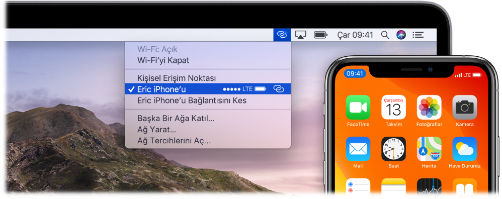 Bir iPhone’a bağlı Kişisel Erişim Noktası’nı gösteren Wi-Fi menüsünün bulunduğu Mac ekranı.