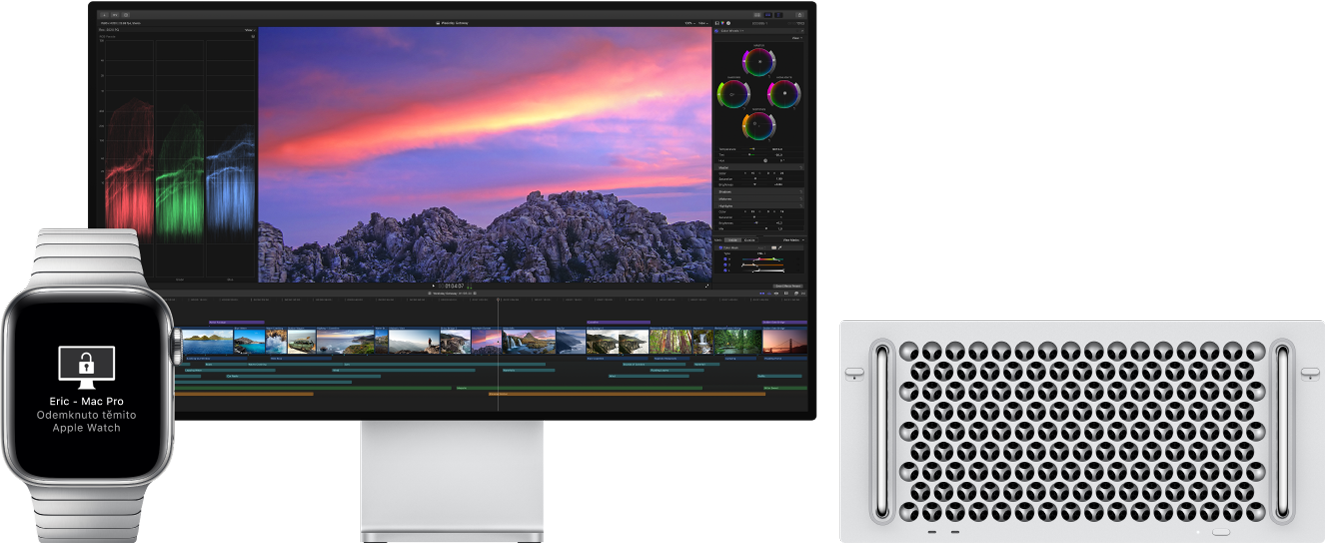 Mac Pro s monitorem a hodinky Apple Watch se zprávou, že Mac byl pomocí hodinek odemčen