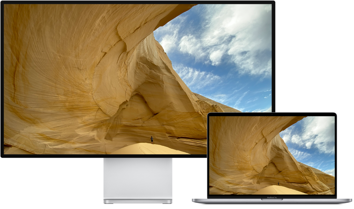 A MacBook Pro next to an HDTV used as an external display.