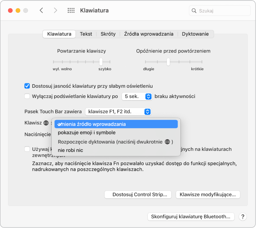 Panel preferencji klawiatury z menu pokazującym opcje klawisza funkcyjnego/z globusem: zmienia źródło wprowadzania; pokazuje emoji i symbole; rozpoczyna dyktowanie; oraz nic nie robi.