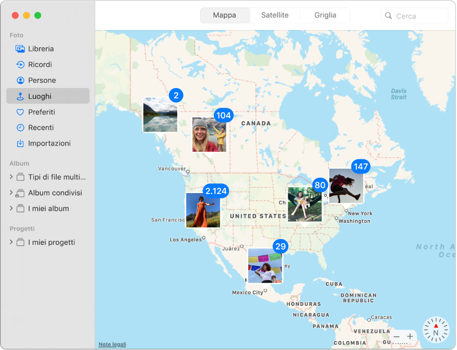 Finestra di Foto che mostra una mappa con le miniature delle foto raggruppate per posizione.