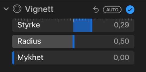 Vignett-kontroller i Juster-panelet, som viser skyveknappene for Styrke, Radius og Mykhet.