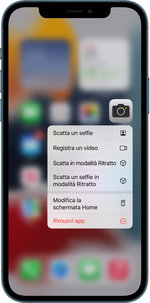 La schermata Home sfocata, con il menu delle azioni rapide della fotocamera visualizzato sotto l'app Fotocamera.