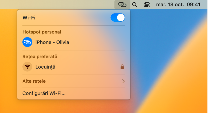 Un ecran Mac cu meniul Wi-Fi afișând un hotspot personal conectat la un iPhone.