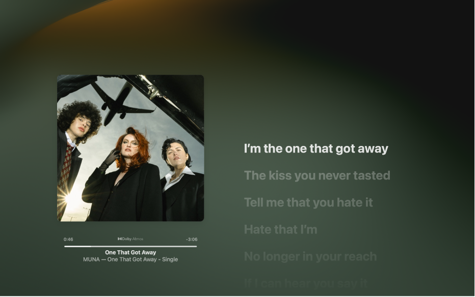 The Full Screen Player with a song playing and lyrics on the right, which appear onscreen in time with the music.