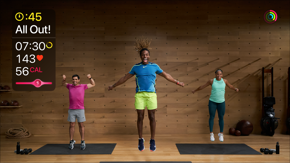 Fitness+ workout on Apple TV showing live data from Apple Watch