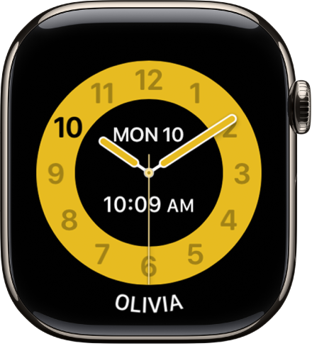 The Schooltime watch face showing an analog clock with the date and digital time near the center. The name of the child who uses the watch is at the bottom.