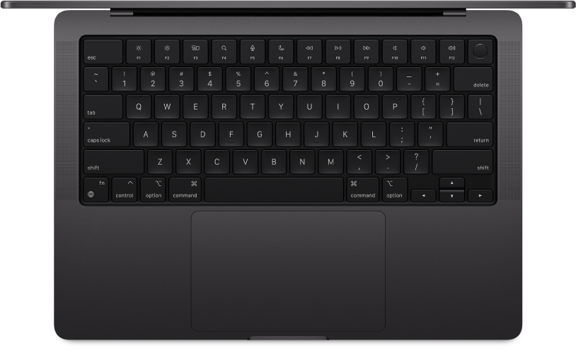 Side view of a MacBook Pro with accompanying accessories.