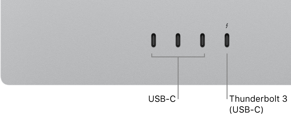 Un primo piano del retro di Studio Display che mostra tre porte USB-C a sinistra e una porta Thunderbolt 3 (USB-C) alla loro destra.