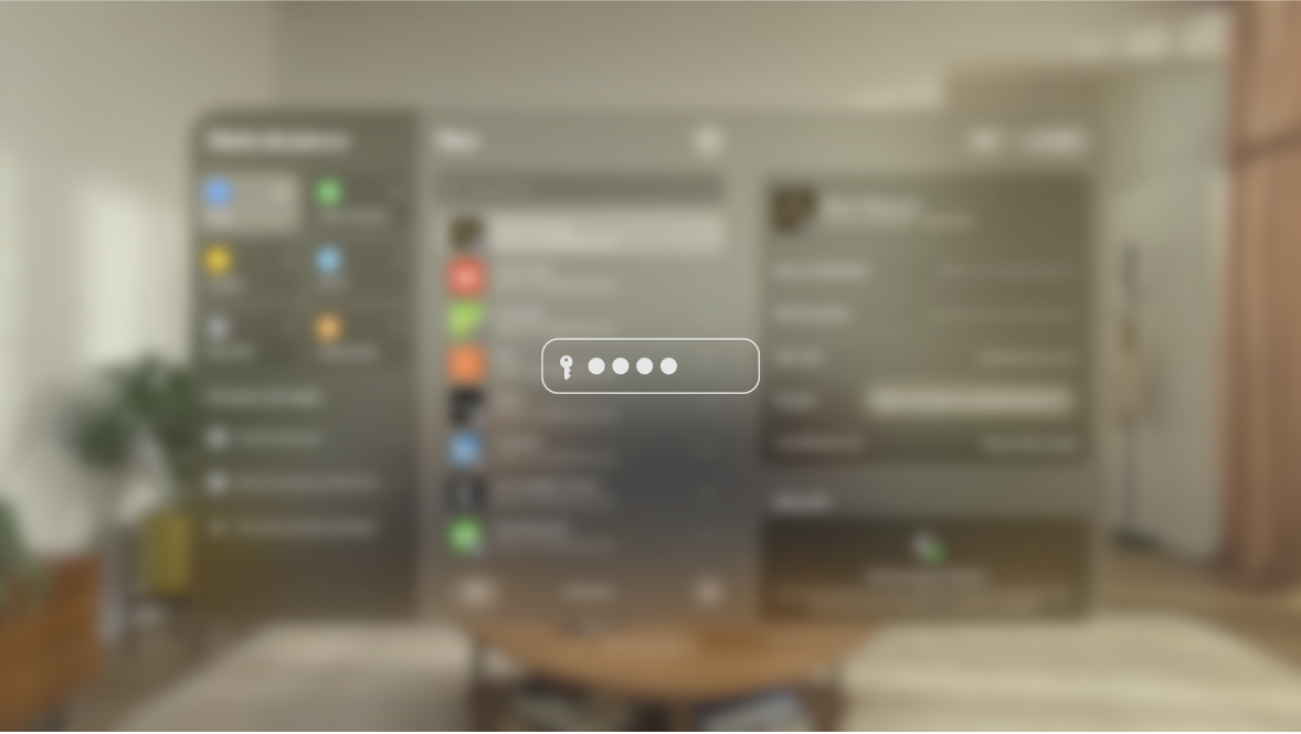 Vue sur l’Apple Vision Pro pendant la saisie d’un mot de passe, le point de vue étant celui d’une personne sur un écran recopié. La vue est floutée, et une image indique que l’utilisateur saisit un mot de passe.