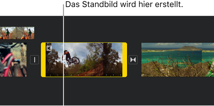 Ein Videoclip in der Timeline mit gelben Aktivpunkten an jeder Seite und der Abspielposition an der Stelle, an der das Standbild eingefügt wird.