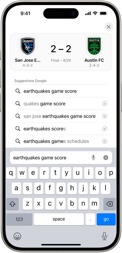 Un écran de recherche Safari, avec le clavier à l’écran en bas de l’écran. Au-dessus du clavier, le champ de recherche contient le texte « earthquakes game score ».