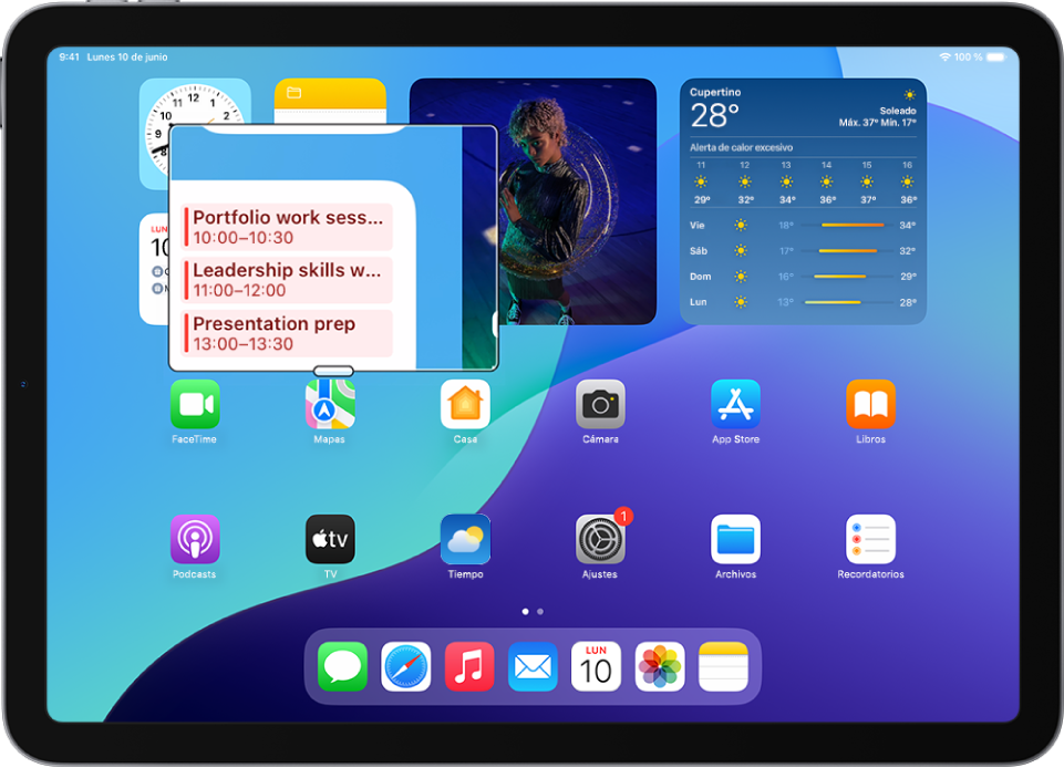 Un iPad con la pantalla de inicio y una ventana ampliada sobre una parte de la pantalla.