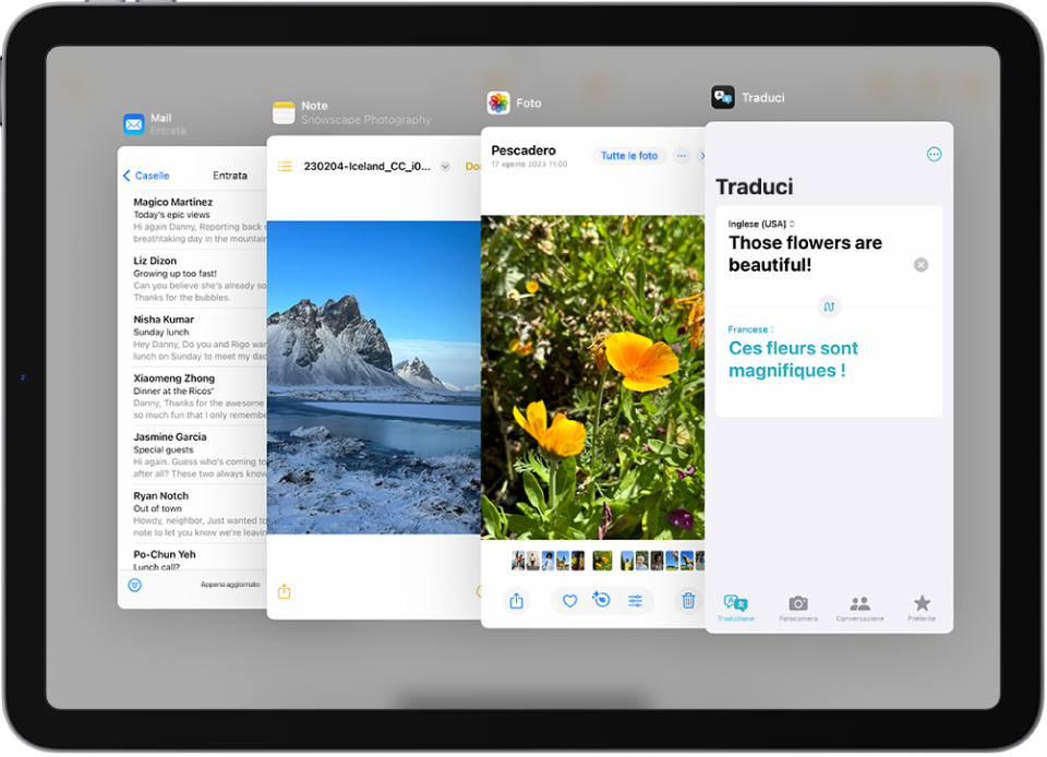 Quattro app aperte in finestre Slide Over, tra cui Mail, Foto, Traduci e Note.