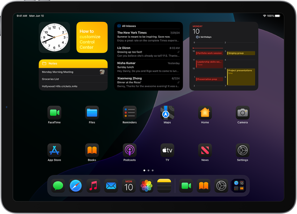 The iPad Home Screen with Dark Mode on.