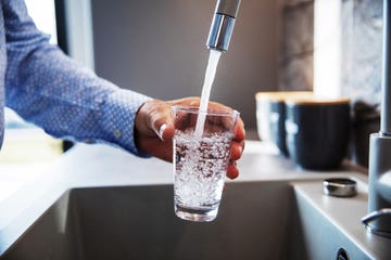 man pouring himself water