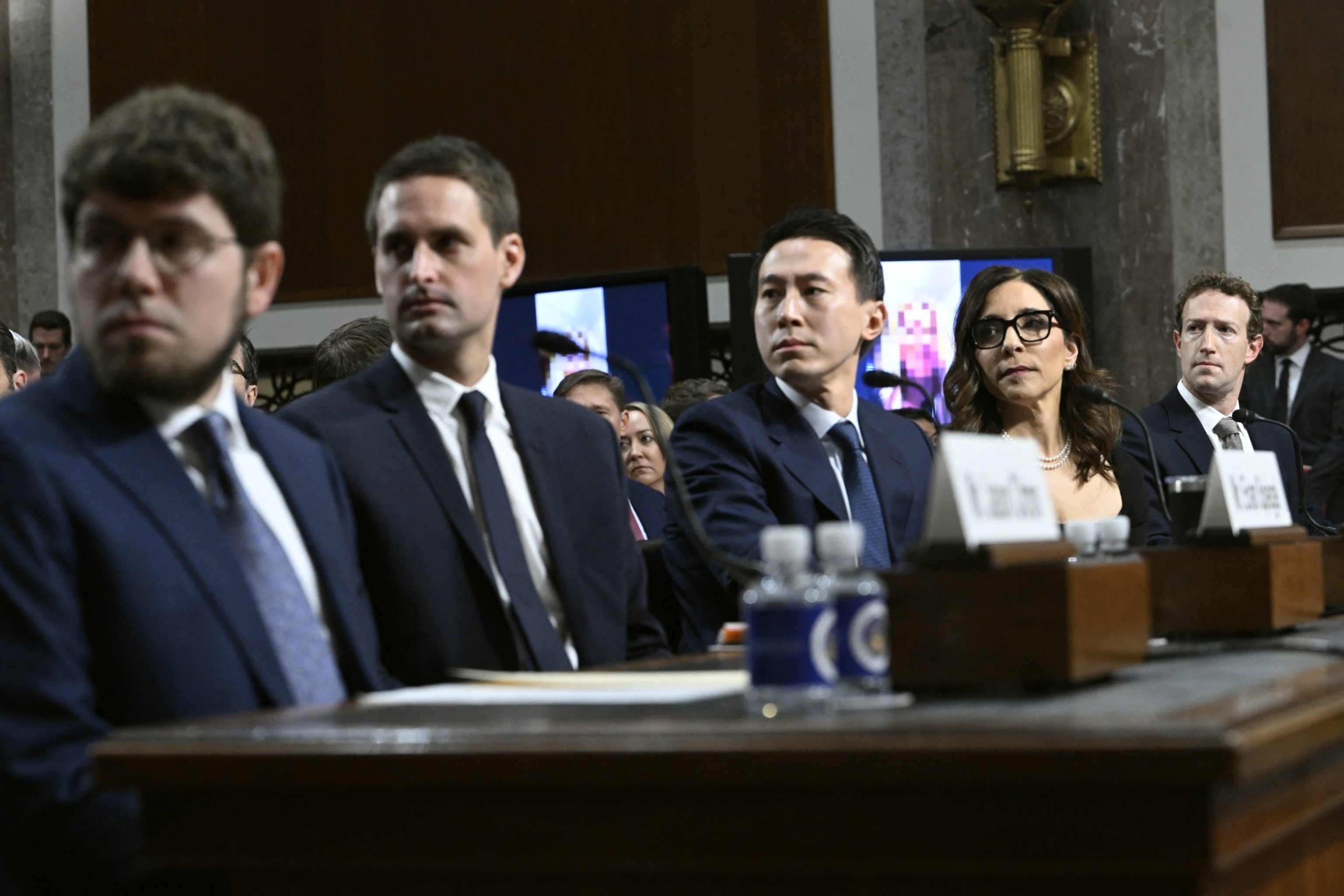 PHOTO: Tech CEO's watch a video of victims before testifying at the US Senate Judiciary Committee hearing, "Big Tech and the Online Child Sexual Exploitation Crisis," in Washington, DC, on January 31, 2024.