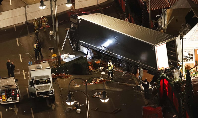 Authorites inspect a truck that had sped into a Christmas market in Berlin, on Dec 19, 2016.— AFP