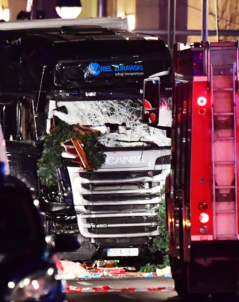 The broken front window is pictured of the truck. — AFP