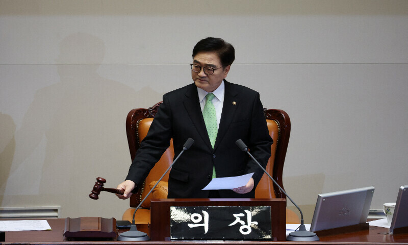 National Assembly Speaker Woo Won-shik bangs a gavel after announcing the result on the day of the impeachment vote of South Korean acting President and Prime Minister Han Duck-soo during a plenary session at the National Assembly in Seoul, South Korea, December 27, 2024 — Reuters