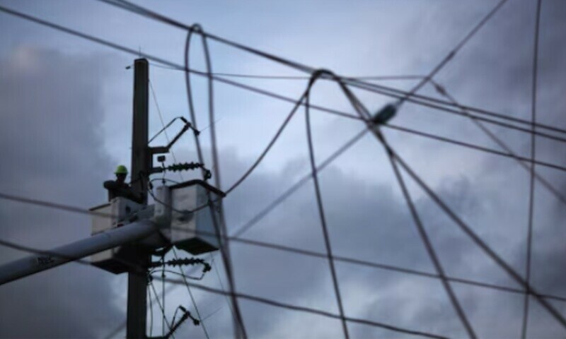 A worker of Puerto Rico’s Electric Power Authority (PREPA) repairs part of the electrical grid in Manati, Puerto Rico October 30, 2017. — Reuters