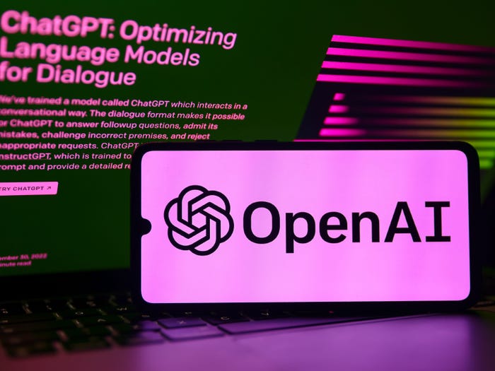 Picture of phone that displays OpenAI logo.