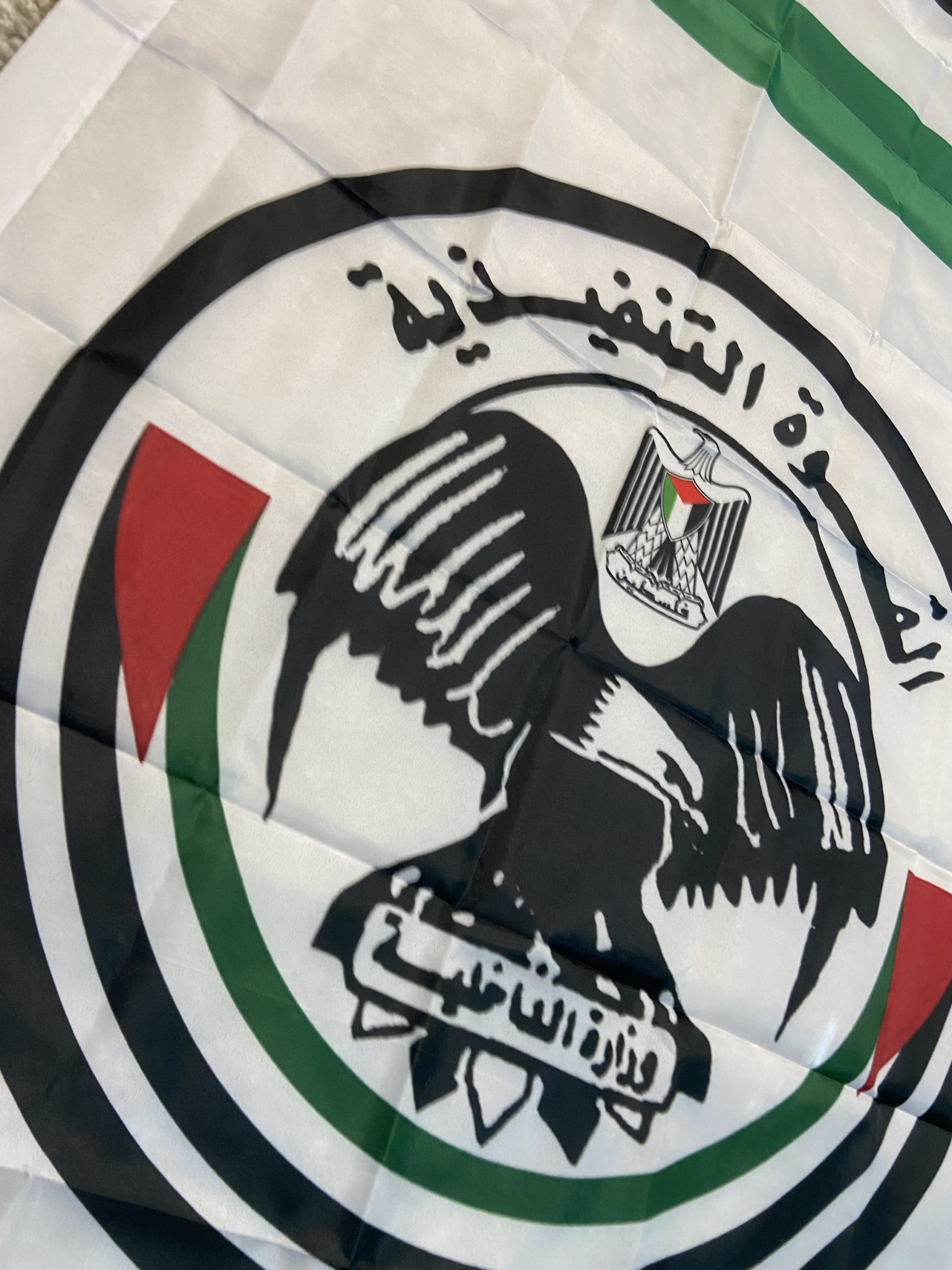 Introducing the Hamas Executive Force Flag, measuring 150 cm in height and 90 cm in width. This flag features the distinct design associated with the Hamas Executive Force, showcasing the iconic eagle emblem and the Palestinian national colors of black, white, green, and red. The text “السلطة التنفيذية” (Executive Authority) and “وزارة الداخلية” (Ministry of Interior) add to its authenticity. Crafted from high-quality polyester, this flag is perfect for collectors, historians, and reenactors who appreciate the detailed symbolism and historical significance of Middle Eastern flags. Whether displayed in a collection or used for educational purposes, this flag is a noteworthy addition for those interested in the history and politics of the region. Please note: This flag is not authentic and is intended for educational and collector purposes only.