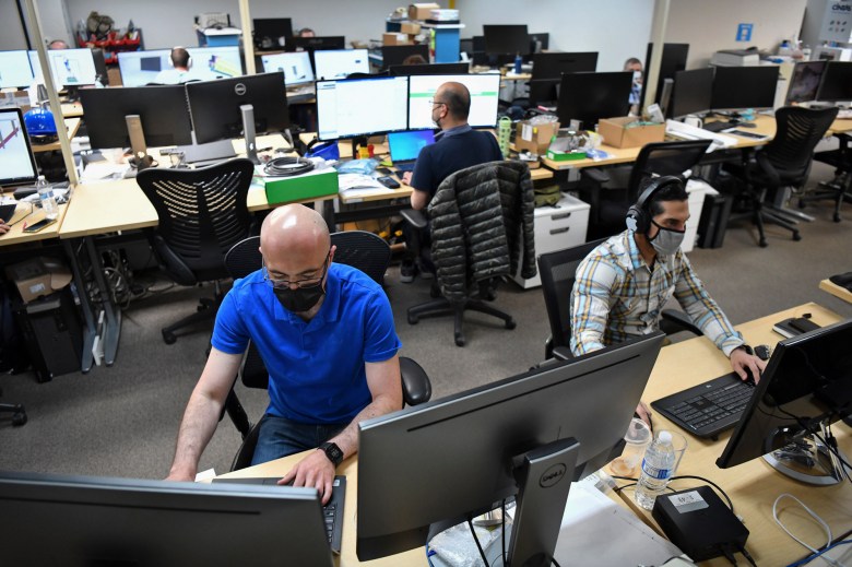 People work at their desks in Campbell on June 11, 2021. Photo by Jose Carlos Fajardo, Bay Area News Group