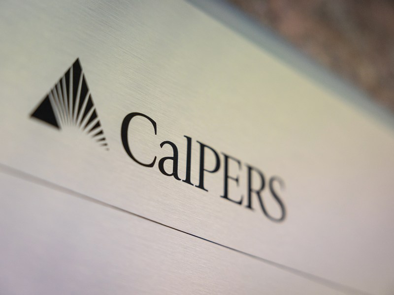 The state Public Employees' Retirement System (CalPERS) logo on a plaque stating the company's vision and mission at the regional office in Sacramento on June 26, 2023. Photo by Rahul Lal for CalMatters