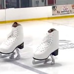 Olympic Ice Skaters Glide Around the Rink Dressed as Giant Ice Skates