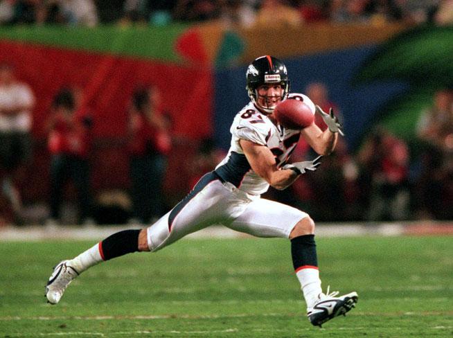 Denver Broncos Ed McCaffrey pulls in a John Elway pass against the Atlanta Falcons during the third quarter of Super Bowl XXXIII at Pro Player Stadium on Jan. 31, 1999.