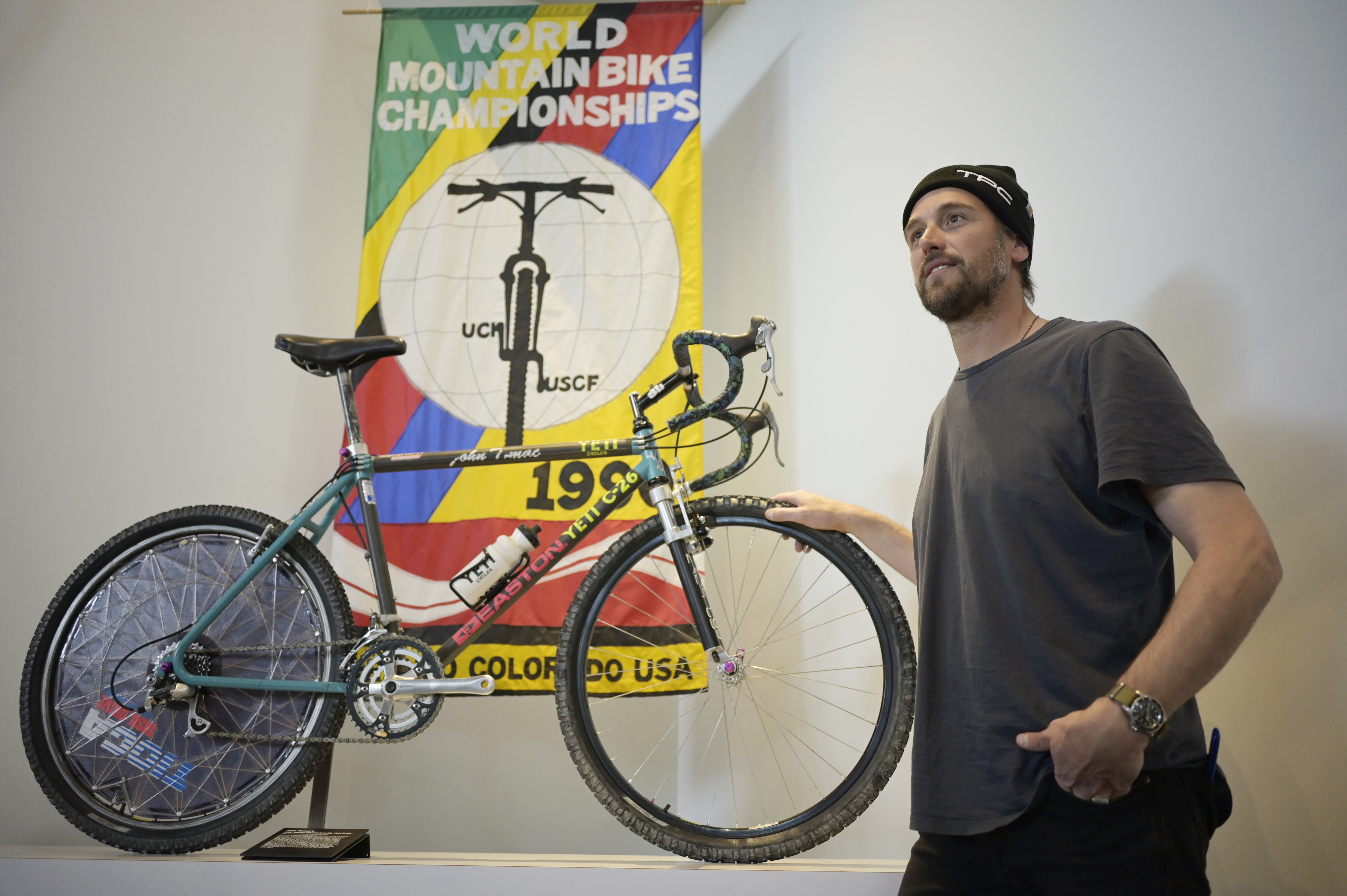 Nick Martin, founder of The Pro's Closet, photographed with John Tomac's 1990 World Championship Yeti C-26 at the TPC office in Louisville. The massive TPC facility includes a museum of vintage bikes. (Hyoung Chang, The Denver Post)