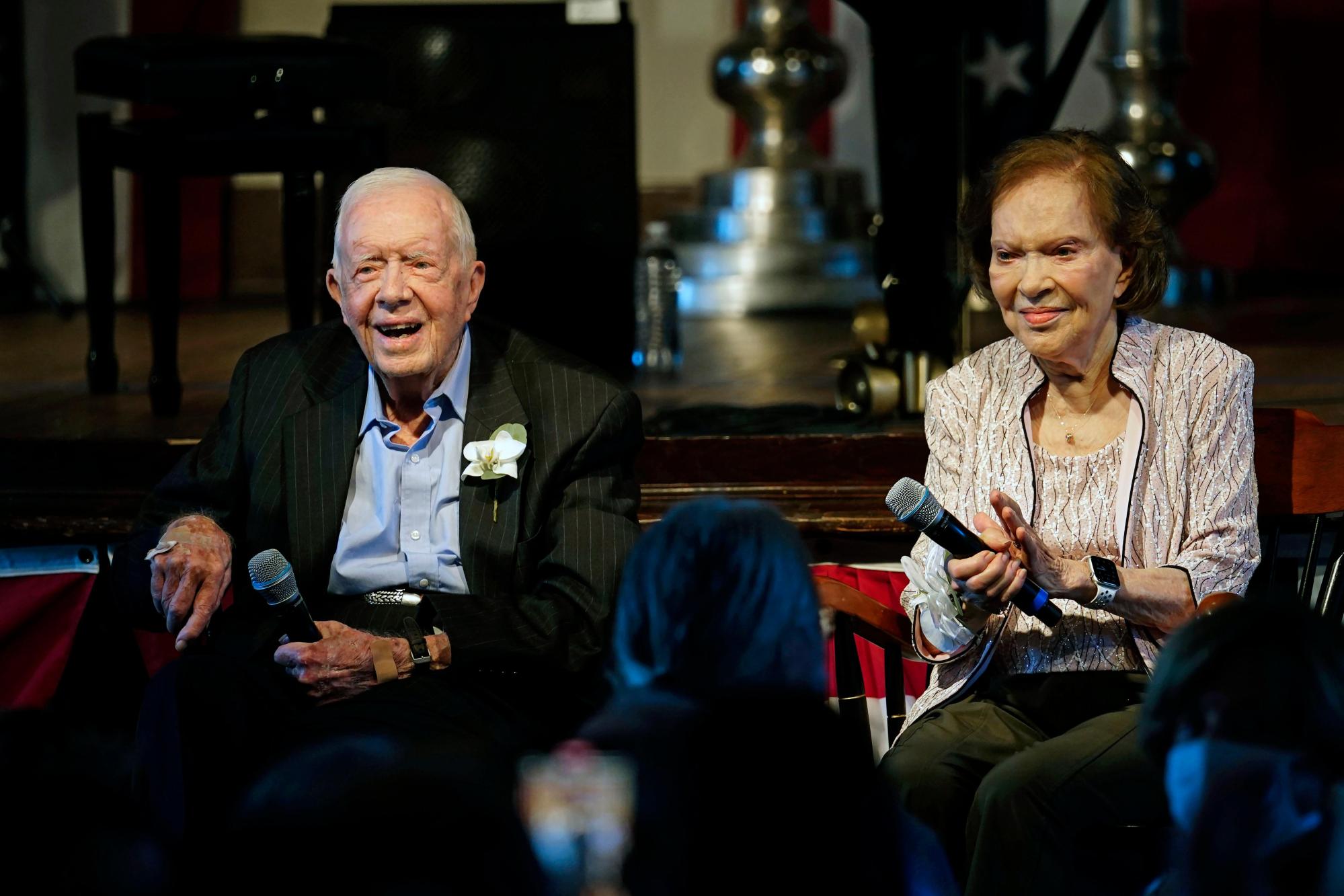 FILE - Former U.S. President Jimmy Carter and his wife, former first lady Rosalynn Carter, sit together during a reception to celebrate their 75th wedding anniversary, July 10, 2021, in Plains, Ga. Rosalynn Carter, the closest adviser to Jimmy Carter during his one term as U.S. president and their four decades thereafter as global humanitarians, died Sunday, Nov. 19, 2023. She was 96. (AP Photo/John Bazemore, Pool, File)