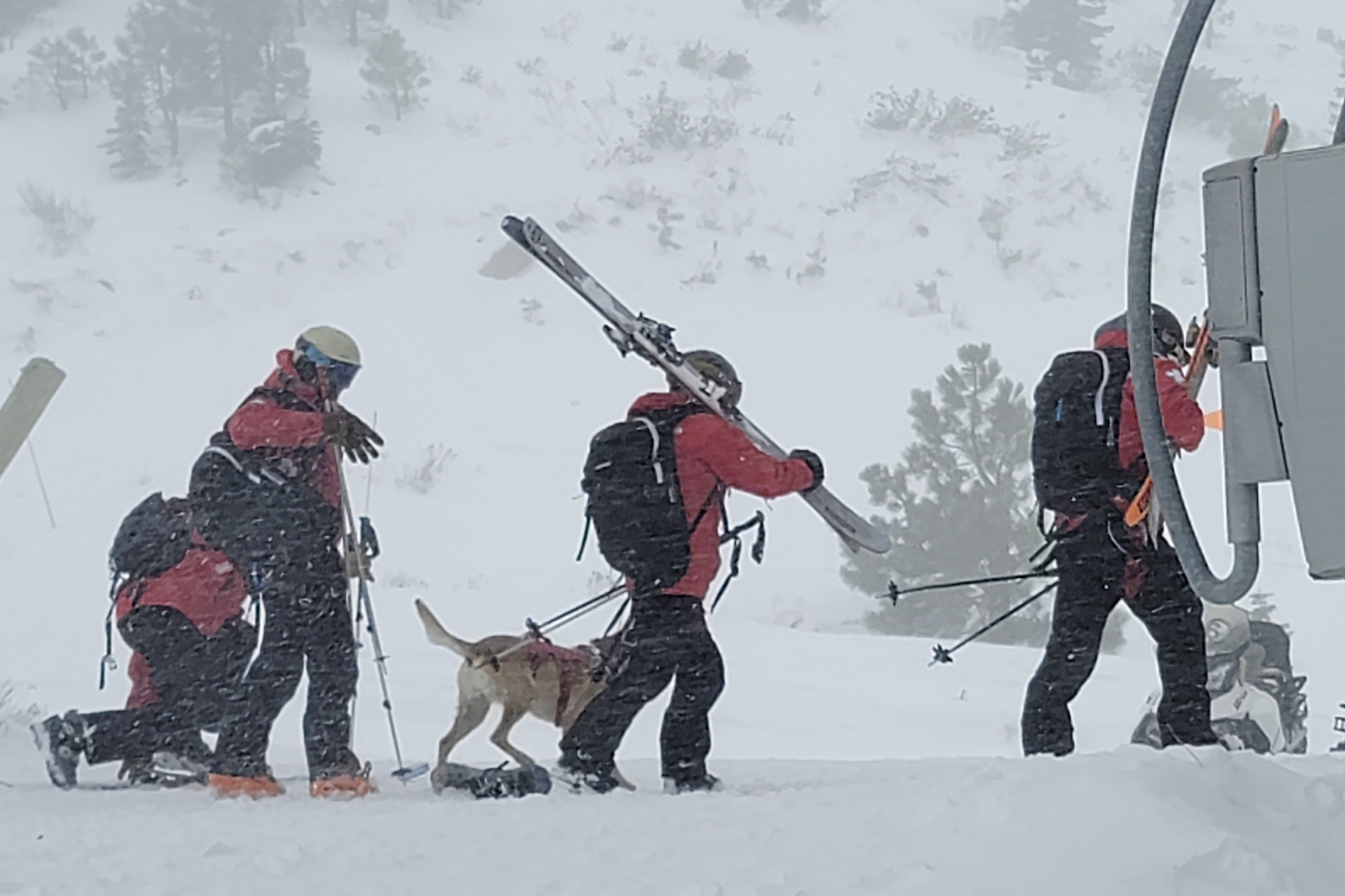 Rescue crews work at the scene of an avalanche at the Palisades Tahoe ski resort on Wednesday, Jan. 10, 2024, near Lake Tahoe, Calif. The avalanche roared through a section of expert trails at the ski resort, killing one person, injuring another, and burying two others. (Mark Sponsler via AP)