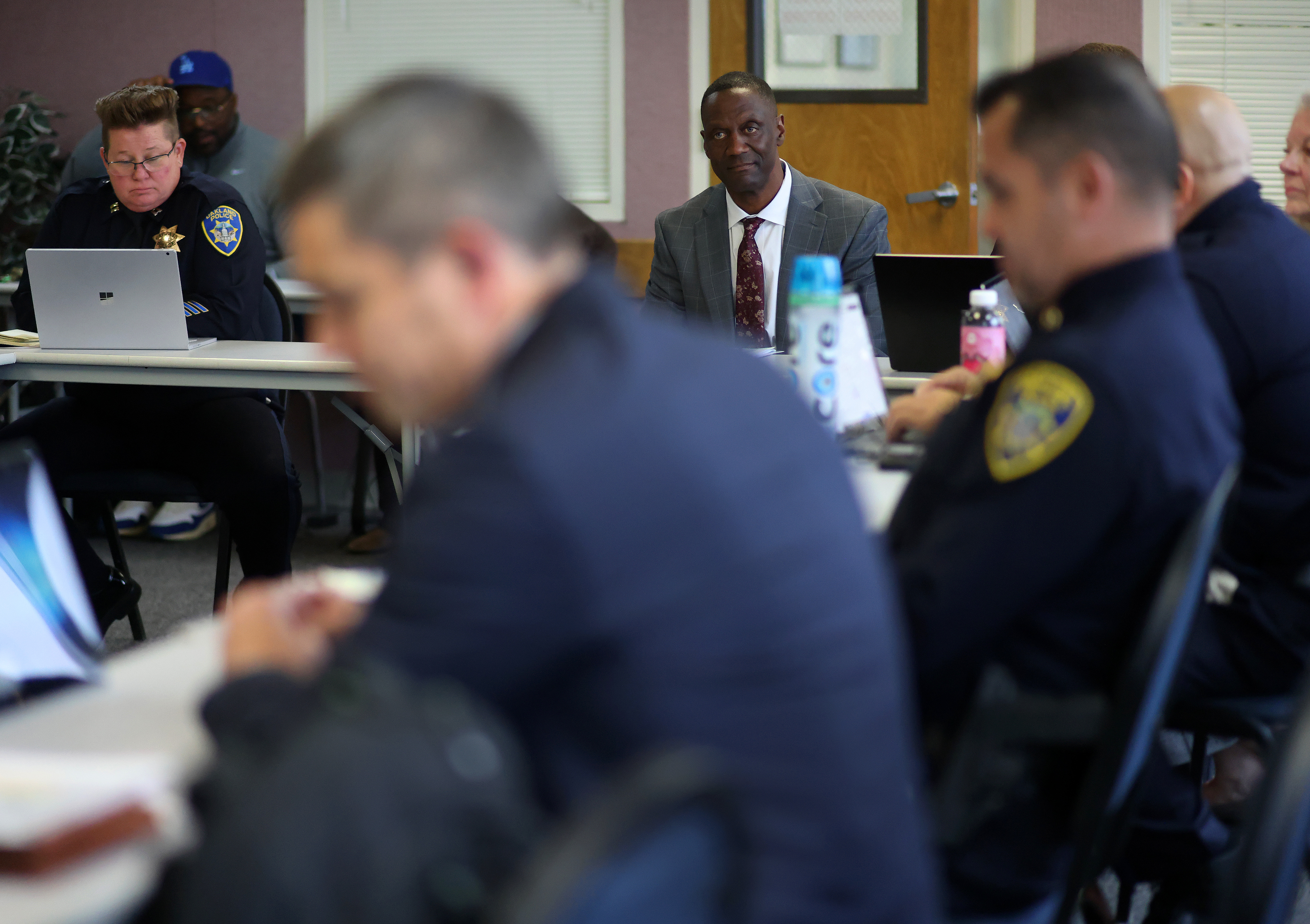 Oakland Police Chief Floyd Mitchell, center, takes part in a weekly crime meeting at department headquarters on Monday, May 13, 2024, in Oakland, Calif.(Aric Crabb/Bay Area News Group)