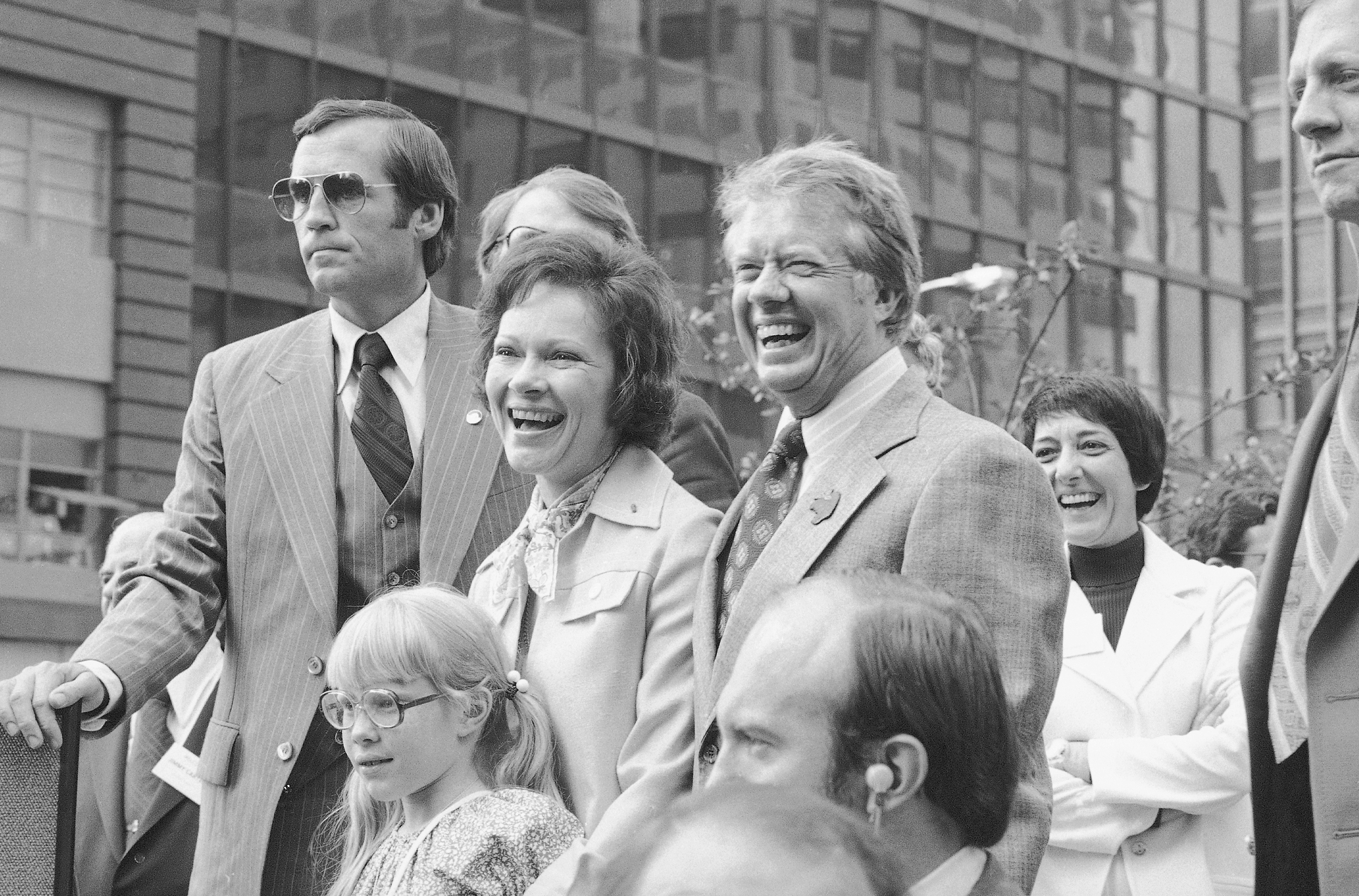 FILE - In this July 10, 1976, file photo Jimmy Carter, his wife Rosalynn and daughter Amy, lower left, respond to a huge crowd that welcomed them to New York. Jimmy and Rosalynn are celebrating their 77th wedding anniversary, Friday, July 7, 2023. (AP Photo, File)