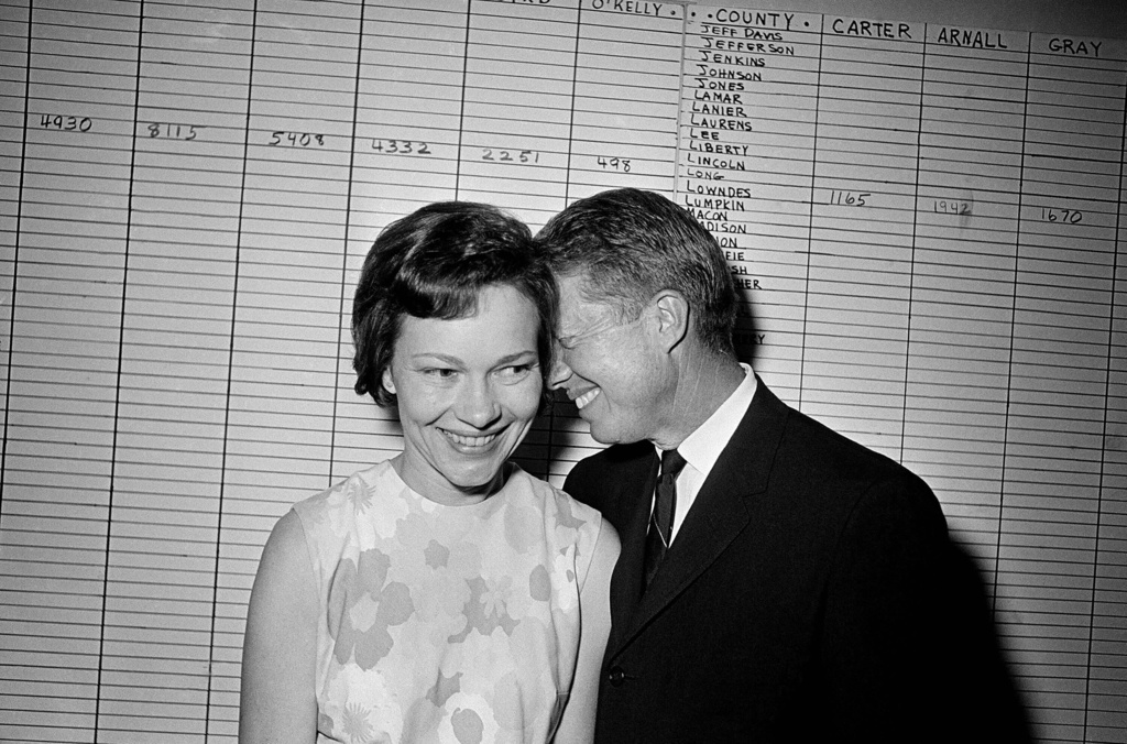 FILE - Georgia state Sen. Jimmy Carter and his wife, Rosalynn, at his Atlanta campaign headquarters, 1966. (AP Photo, File)