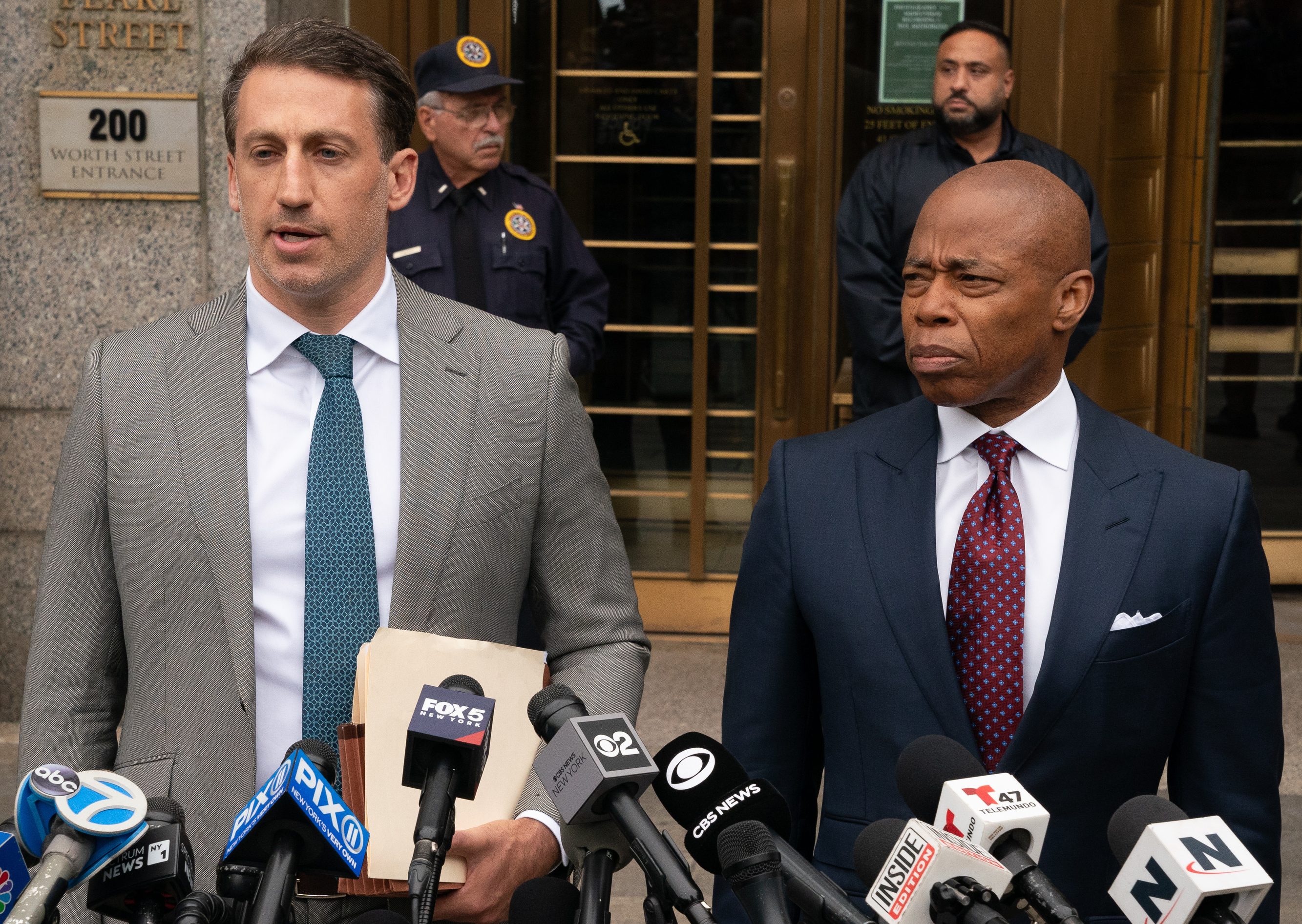 Mayor Eric Adams (right), is pictured outside Manhattan Federal Court with his lawyer, Alex Spiro, after pleading not guilty on multiple corruption charges Friday, Sept. 27, 2024 in Manhattan.