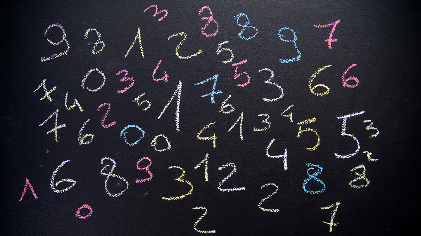 image of numbers written on a chalkboard